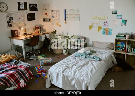 Student Bedroom Showing Messy Study Space and Everyday Home Life Stock Photo