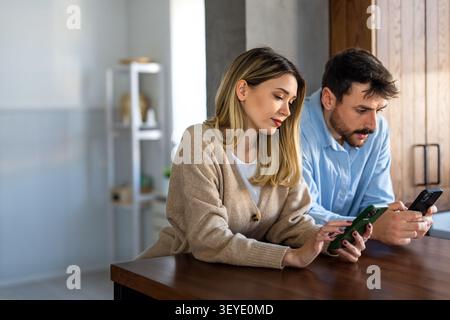 A couple quietly drifts past each other in daily life, showing emotional distance, fading connection Stock Photo