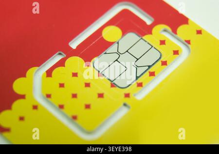 Macro Photo of GSM SIM Card on White background Stock Photo
