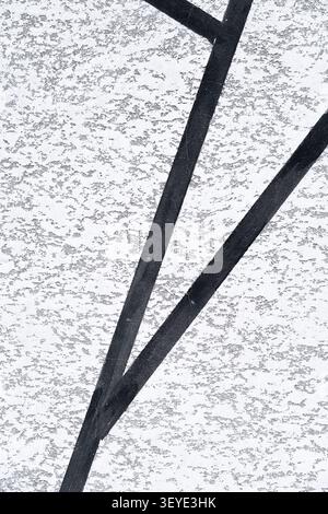 Close up view of gritty monochrome wall plaster texture for modern design backdrop. Concept: Textured minimalist abstract Stock Photo