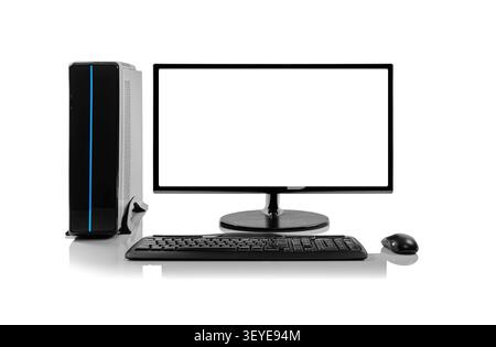 A modern desktop computer setup on a reflective white surface. Stock Photo