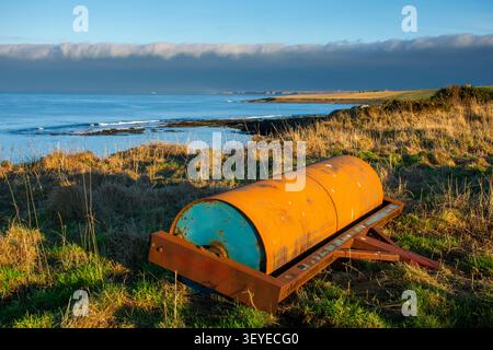 Heavy duty roller on a farm overlooking the Pentland Firth, Caithness, Scotland, UK Stock Photo
