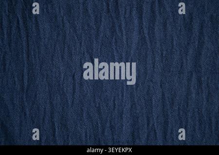 Navy blue fabric texture with subtle wrinkles, ideal background for design and product photography Stock Photo