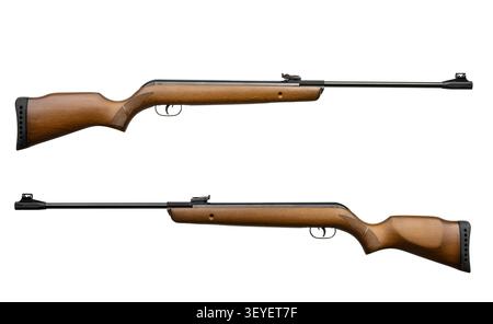 Two air rifles with wooden stocks shown from both sides, isolated on a white background. Stock Photo