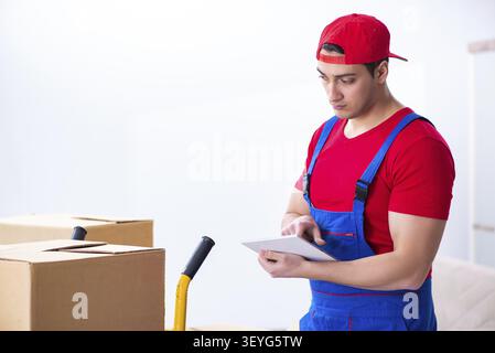 Contractor worker moving boxes during office move Stock Photo