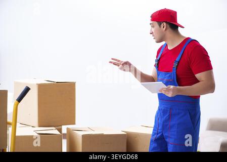 Contractor worker moving boxes during office move Stock Photo