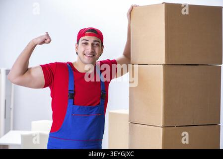 Contractor worker moving boxes during office move Stock Photo