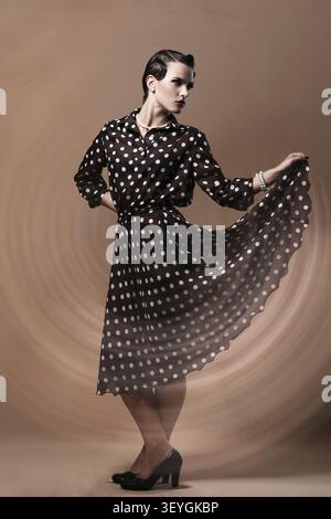 Young and beautiful woman in vintage image Stock Photo