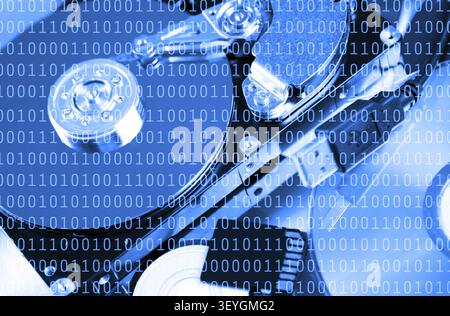 Binary code numbers with hardware on background Stock Photo