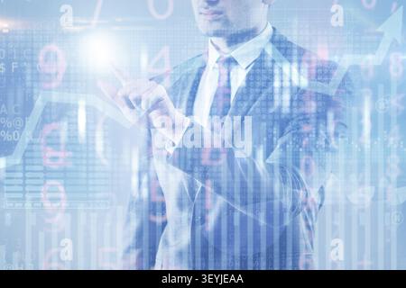 BUsinessman pressing virtual button on diagram chart Stock Photo