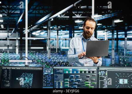 Technical specialist in computing facility configuring hardware specifically enhanced for AI tasks, increasing workloads, while automating system diagnostics working with machine learning predictions. Stock Photo