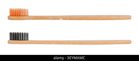 Two eco-friendly bamboo toothbrushes with orange and black bristles isolated on white background. Stock Photo