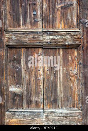 Weathered old wooden door with rich natural wood texture Stock Photo