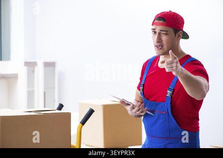 Contractor worker moving boxes during office move Stock Photo