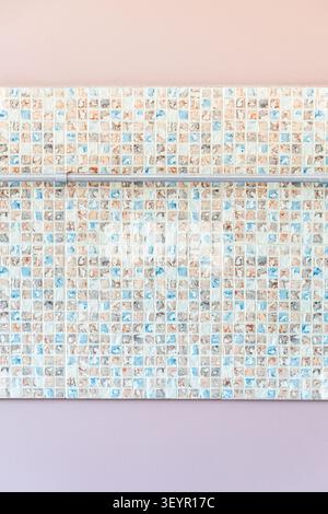 mosaic ceramic tile with railing on pink kitchen wall during home renovation Stock Photo
