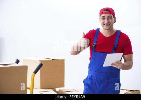 Contractor worker moving boxes during office move Stock Photo