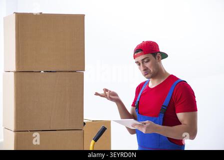 Contractor worker moving boxes during office move Stock Photo