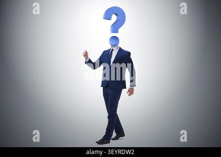 Businessman with question mark instead of head Stock Photo