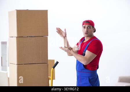 Contractor worker moving boxes during office move Stock Photo