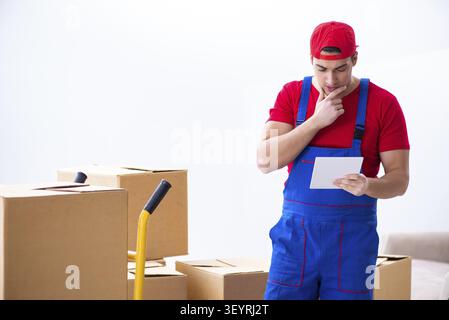 Contractor worker moving boxes during office move Stock Photo