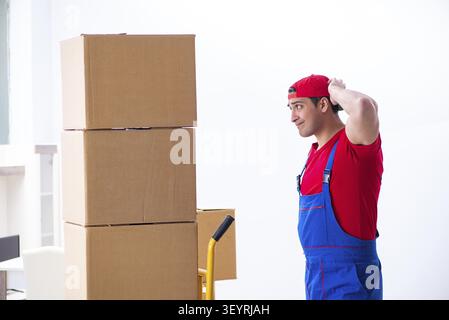 Contractor worker moving boxes during office move Stock Photo