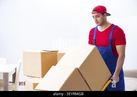 Contractor worker moving boxes during office move Stock Photo