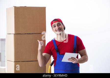 Contractor worker moving boxes during office move Stock Photo