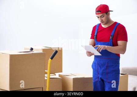 Contractor worker moving boxes during office move Stock Photo