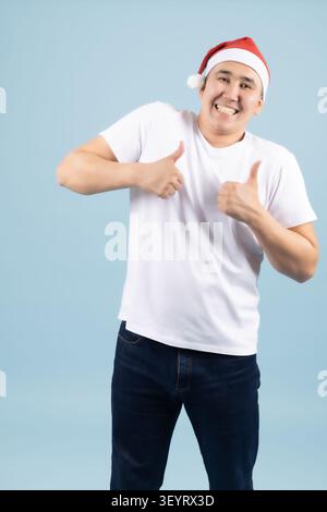 Cheerful man posing with hands on chest smiling Stock Photo