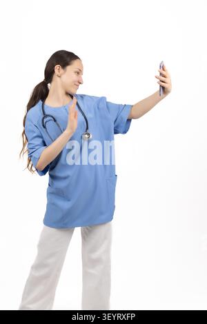 Medical professional posing with hands on hips confident Stock Photo