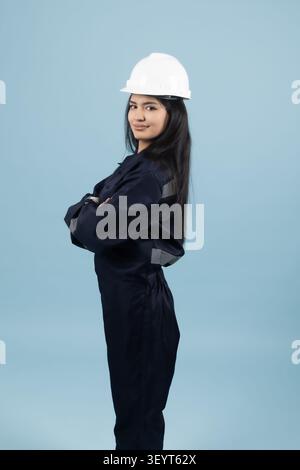 Medical professional wearing helmet posing standing Stock Photo