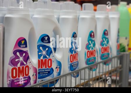 Alanya, Turkey - May 31, 2026: OMO laundry detergent bottles arranged on a shelf in a store, showcasing different formulations and vibrant packaging d Stock Photo