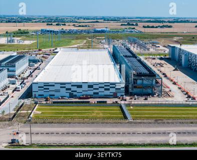 Hutto, Texas - July 4, 2026: Aerial view of a large data center campus with massive buildings with total of 400M sq ft of space and 600MW power Stock Photo