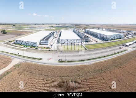 Aerial view of a large data center campus in Hutto, Texas, with three massive buildings with 400M square feet of space and 600MW power capacity Stock Photo