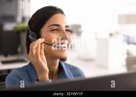 Portrait of call center, customer support services worker Stock Photo