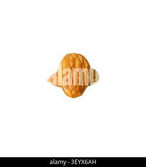 Almond nuts in stacks are isolated on white background with clipping path. Stock Photo