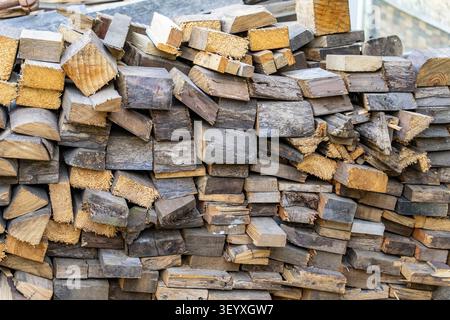Wooden boards are stacked in a sawmill or carpentry shop Stock Photo
