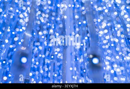 multicolored city led lights beams Stock Photo