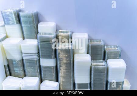 Pile of disposable plastic containers for take away food. plastic boxes for food packaging Stock Photo