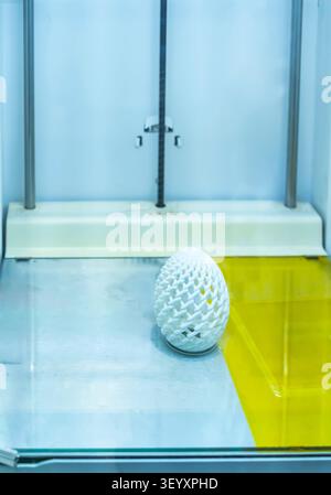 white plastic model of egg printed on a 3D printer Stock Photo