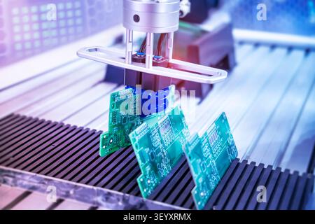 automtic flexible robotic arm system in intellegence pcb factory Stock Photo