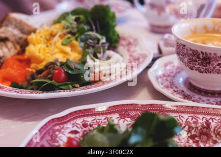 Delicious breakfasts served on vintage tableware, a festive restaurant atmosphere Stock Photo