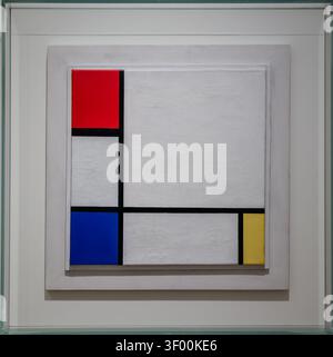 Composition with Yellow, Red, Black, Blue and Grey by Piet Mondrian at the Stedelijk Museum in Amsterdam, Netherlands. Stock Photo