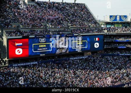A screen displays a possible penalty during a review at the World Cup ...