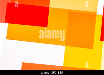 Vibrant abstract background featuring layered translucent rectangles in red, orange, and yellow on white. Modern geometric composition with soft gradi Stock Photo