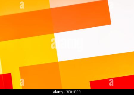 Vibrant abstract background with overlapping translucent rectangles in orange, yellow, and red tones, featuring clean lines for modern design. Stock Photo