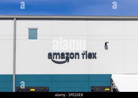 Wixom, MI, USA June 13 2026 : Amazon Flex logo displayed on the exterior wall of a logistics warehouse Stock Photo