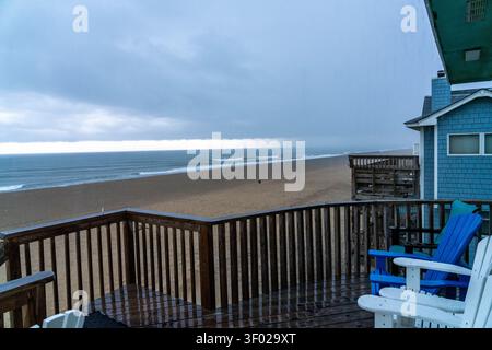 A Rain Storm Moving Over the Beach in Avon North Carolina With Clouds and Dark Skies Stock Photo