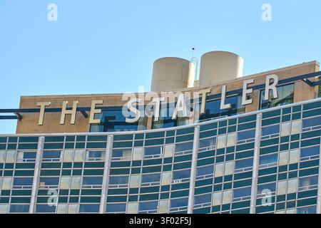 DALLAS, TX, USA - FEBRUARY 16, 2024: The Statler hotel, an iconic landmark in downtown Dallas, showcases its name prominently in large white letters a Stock Photo