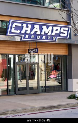 DALLAS, TX, USA - FEBRUARY 16, 2024: The Champs Sports store in Dallas features a prominent blue and white sign above its entrance. The storefront des Stock Photo